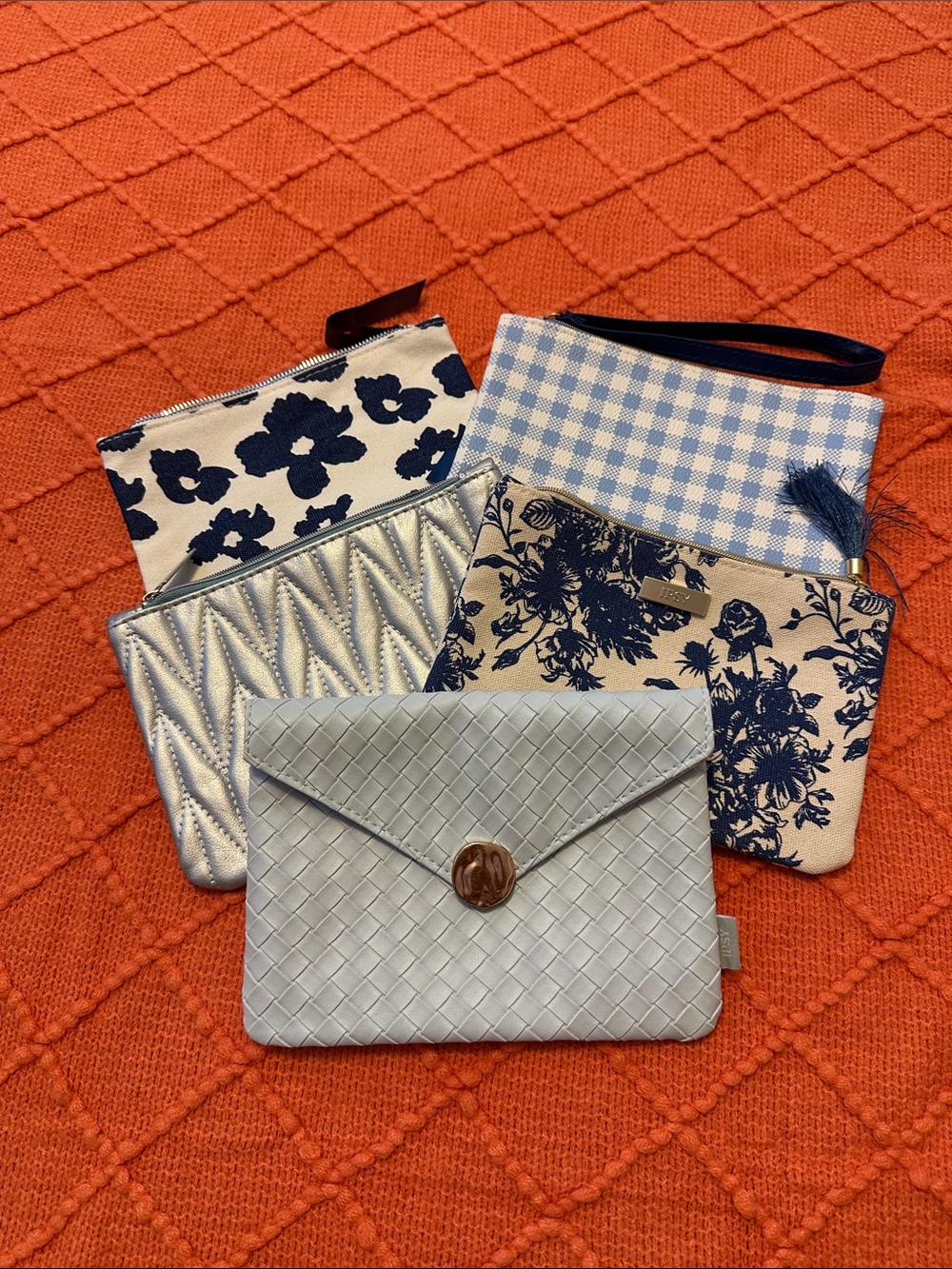 Ipsy makeup bags blue and silver.